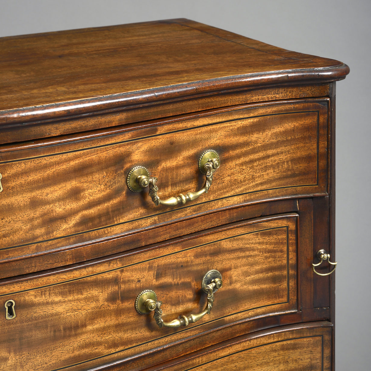 Serpentine chest of drawers