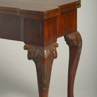 A mid-18th century george ii period mahogany card table