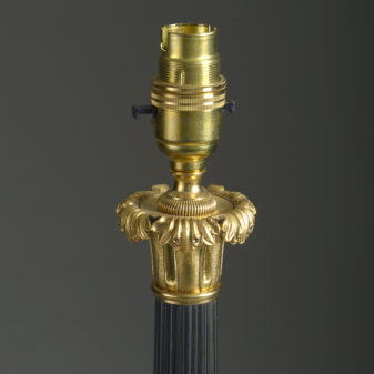 A pair of charles x style bronze & ormolu candlestick lamps