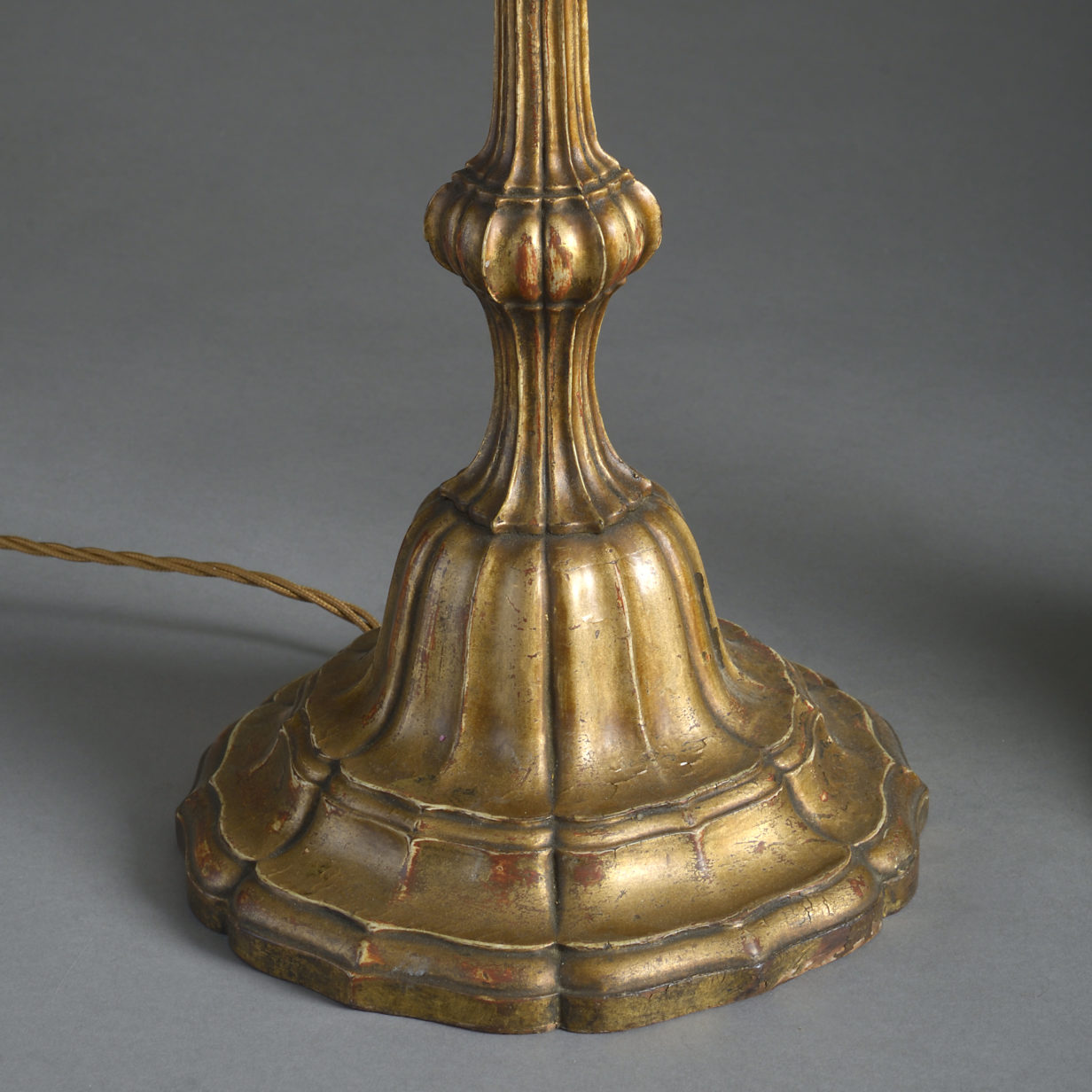 Pair of carved gilded table lamps