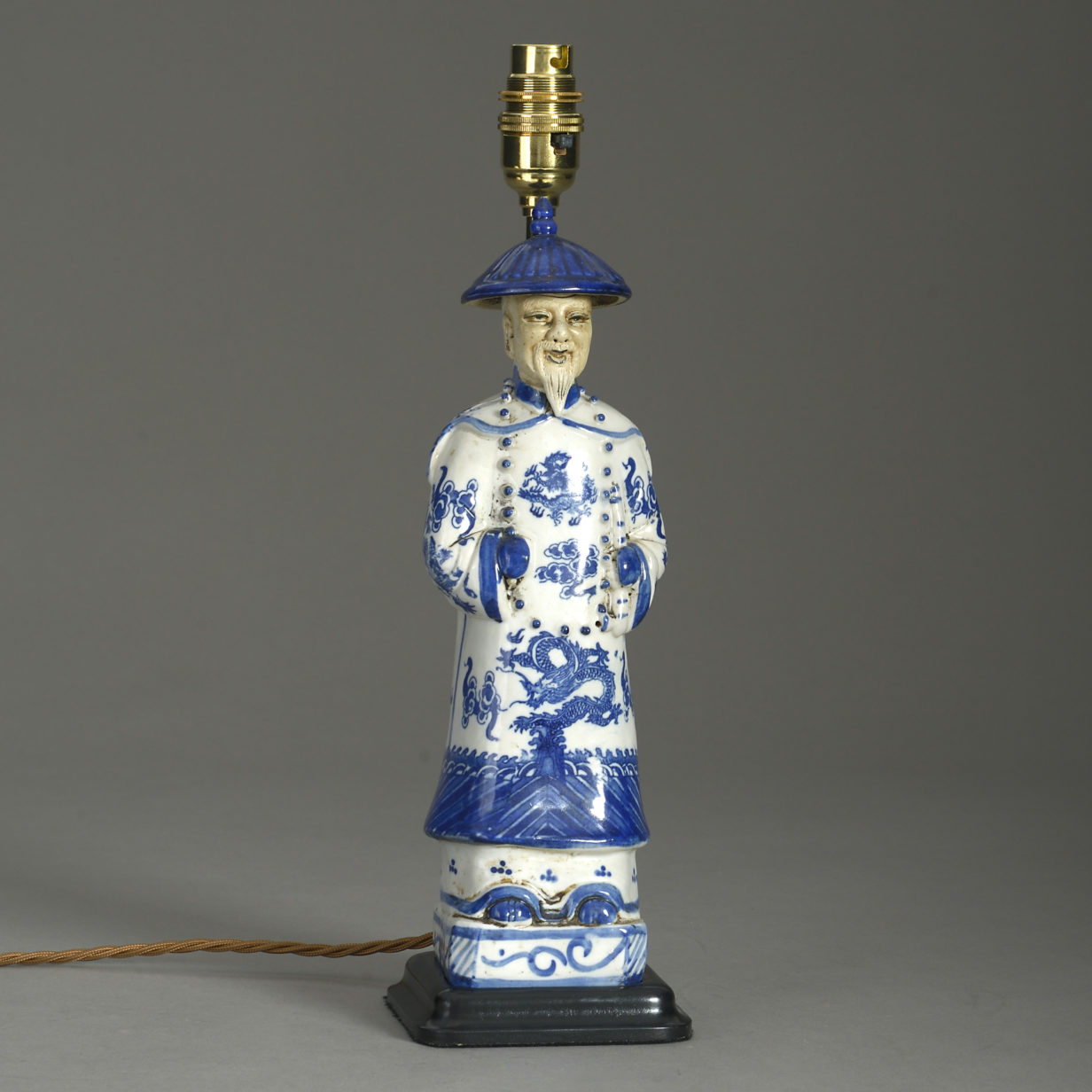 Early 20th century blue & white porcelain chinaman lamp