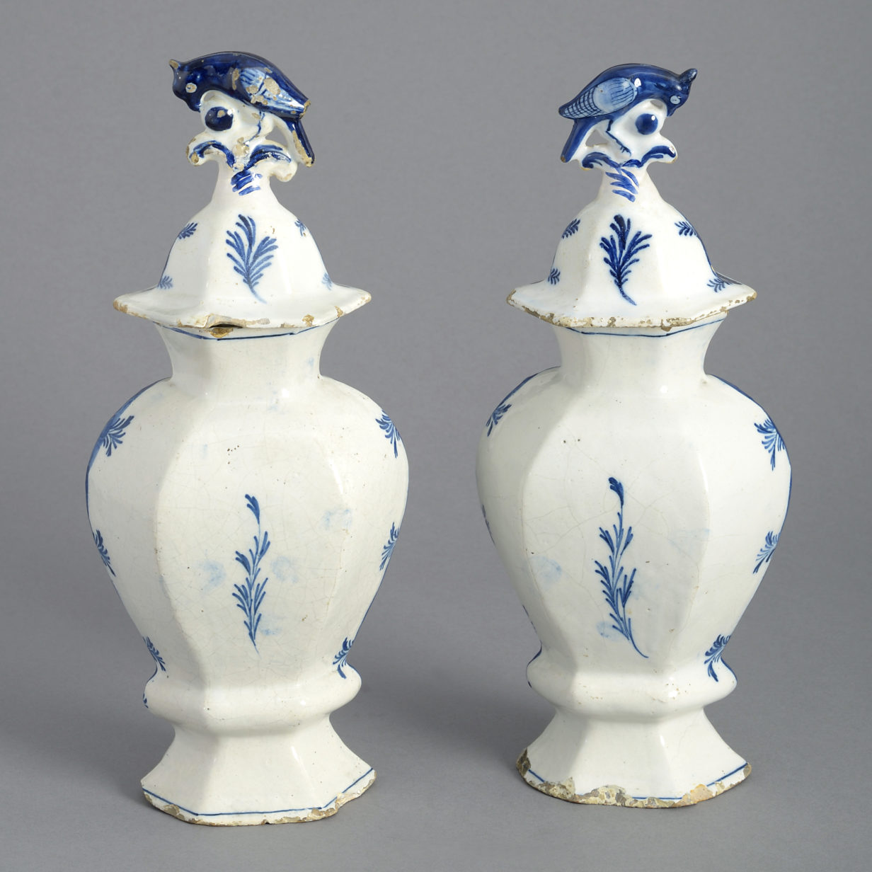 Pair of 18th century blue & white delft vases and covers
