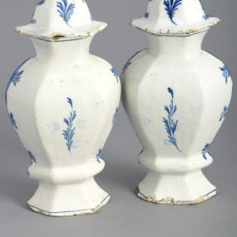 Pair of 18th century blue & white delft vases and covers