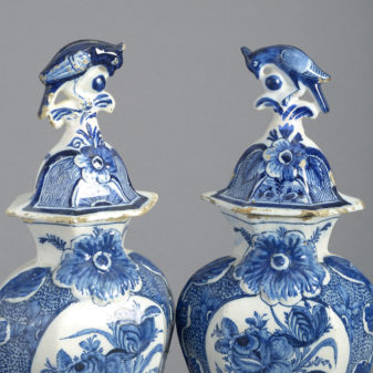 Pair of 18th century blue & white delft vases and covers