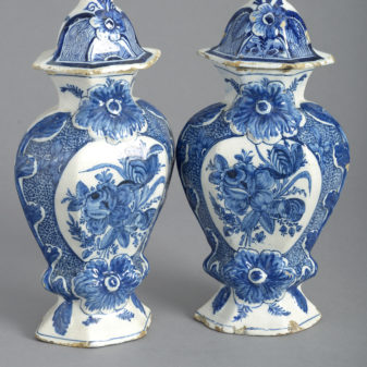 Pair of 18th century blue & white delft vases and covers