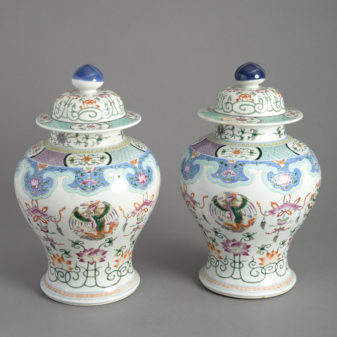 Pair of 19th century famille rose porcelain vases and covers