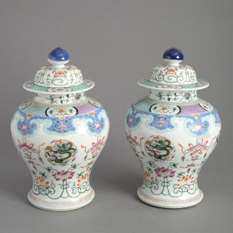 Pair of 19th century famille rose porcelain vases and covers