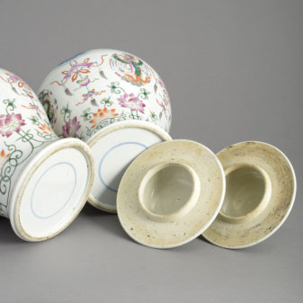 Pair of 19th century famille rose porcelain vases and covers
