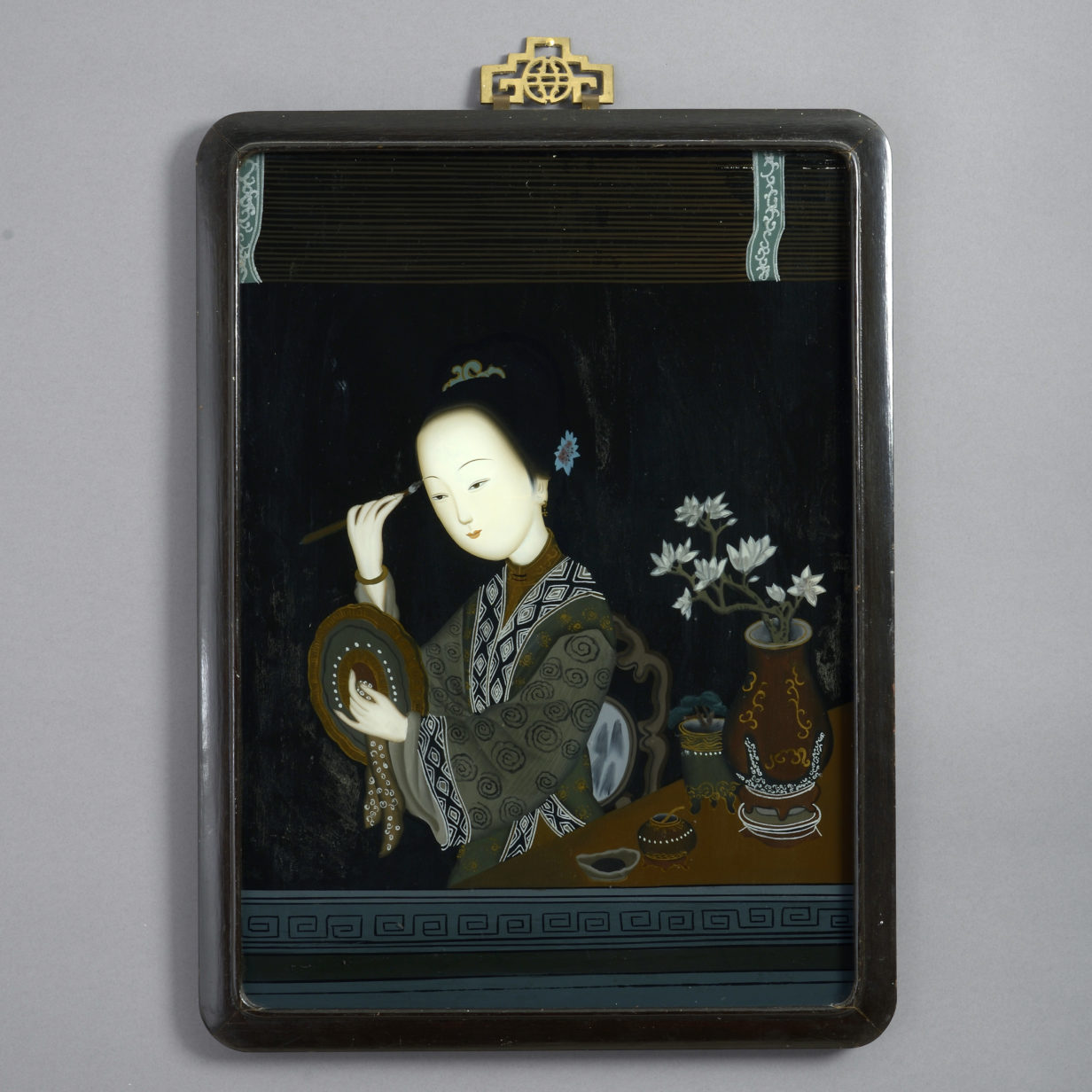 Pair of late 19th century reverse glass portraits