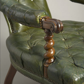 Green leather easy chair