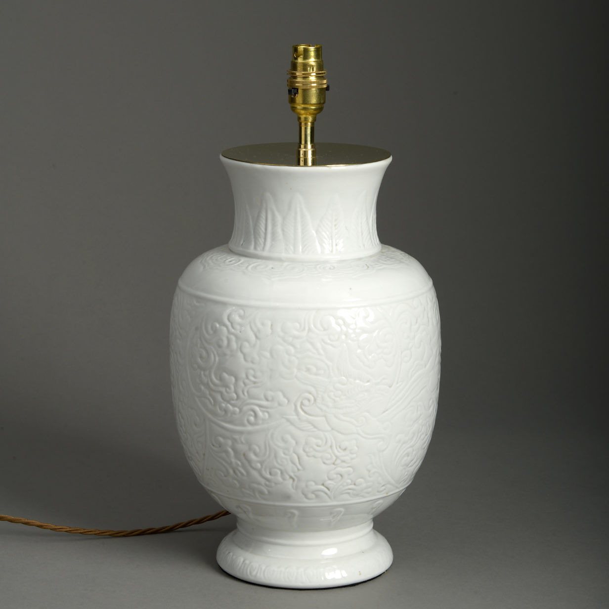 Small white porcelain vase lamp