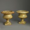Pair of cast iron urns