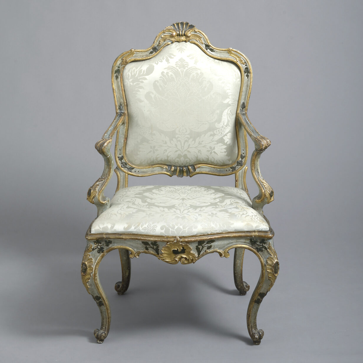 Mid-18th century rococo canapé and open armchairs
