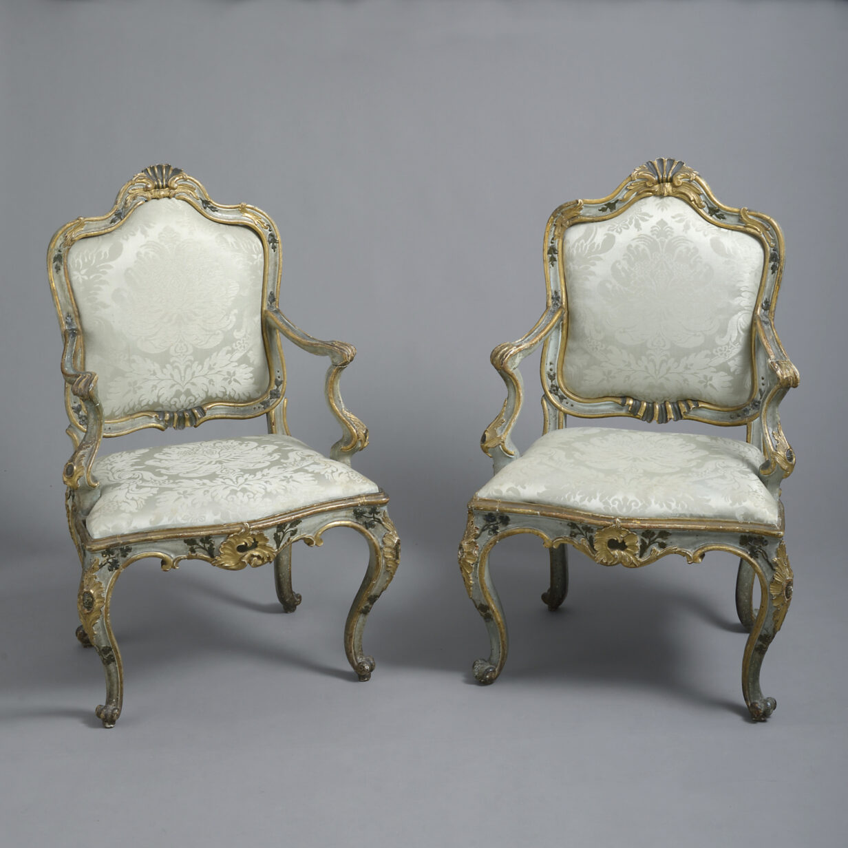 Mid-18th century rococo canapé and open armchairs