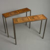 Pair of parquetry and iron console tables