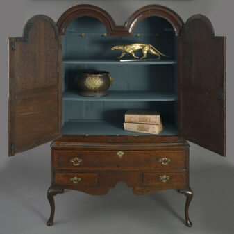 Double domed cabinet on stand