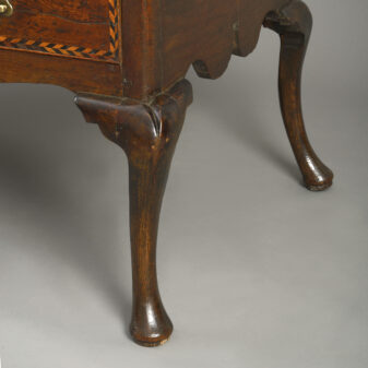 Early 18th century double domed oak cabinet on stand