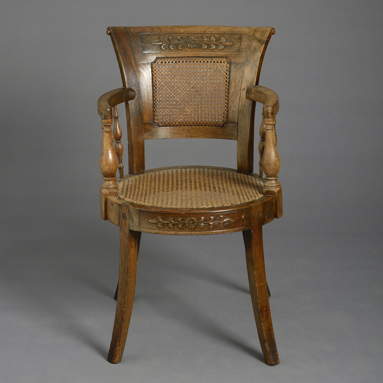 Early 19th century empire period open armchair