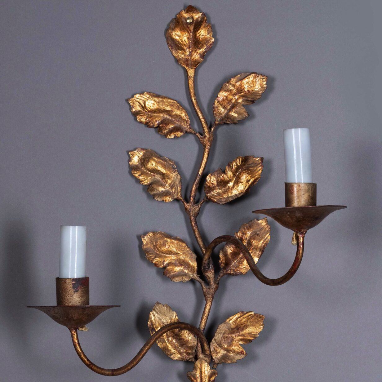 Early 20th century painted and parcel gilded foliate wall light