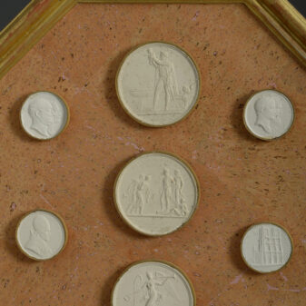 Pair of framed groups of plaster intaglios