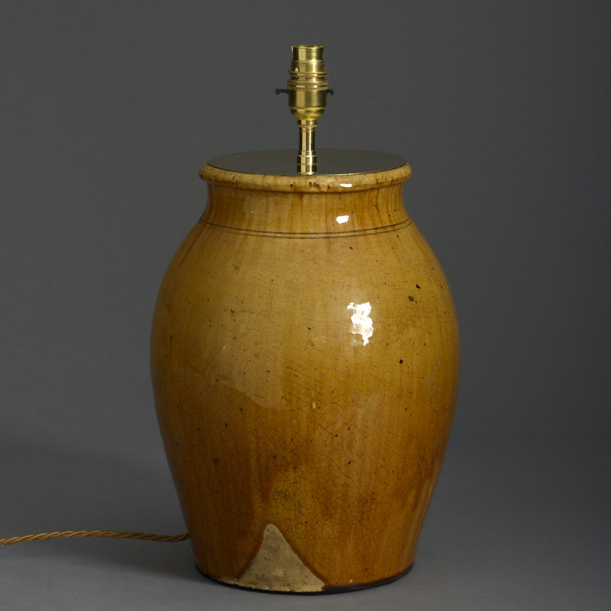 Early 20th century ochre glazed vase lamp