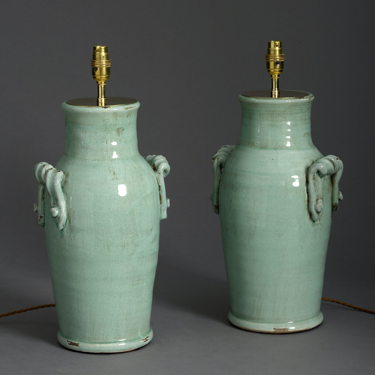 Pair of celadon green crackle glaze vase lamps