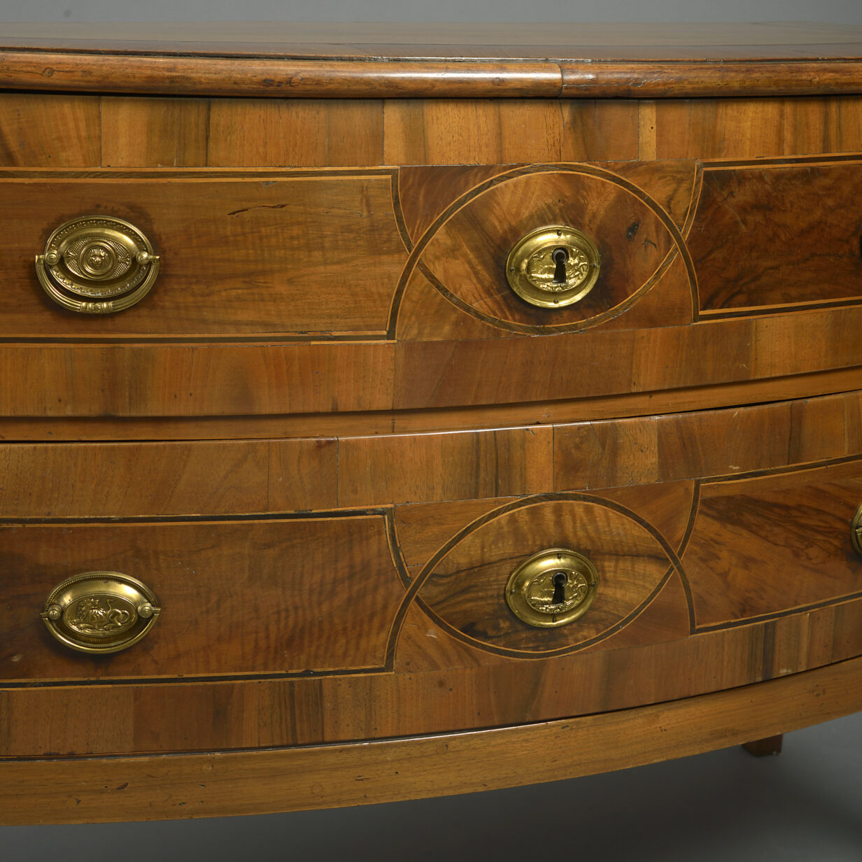 Late 18th century walnut bow front commode
