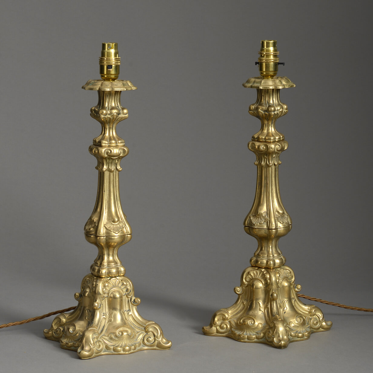 Pair of Polished Cast Brass Rococo Revival Lamps