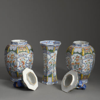 Garniture of three polychrome delft vases
