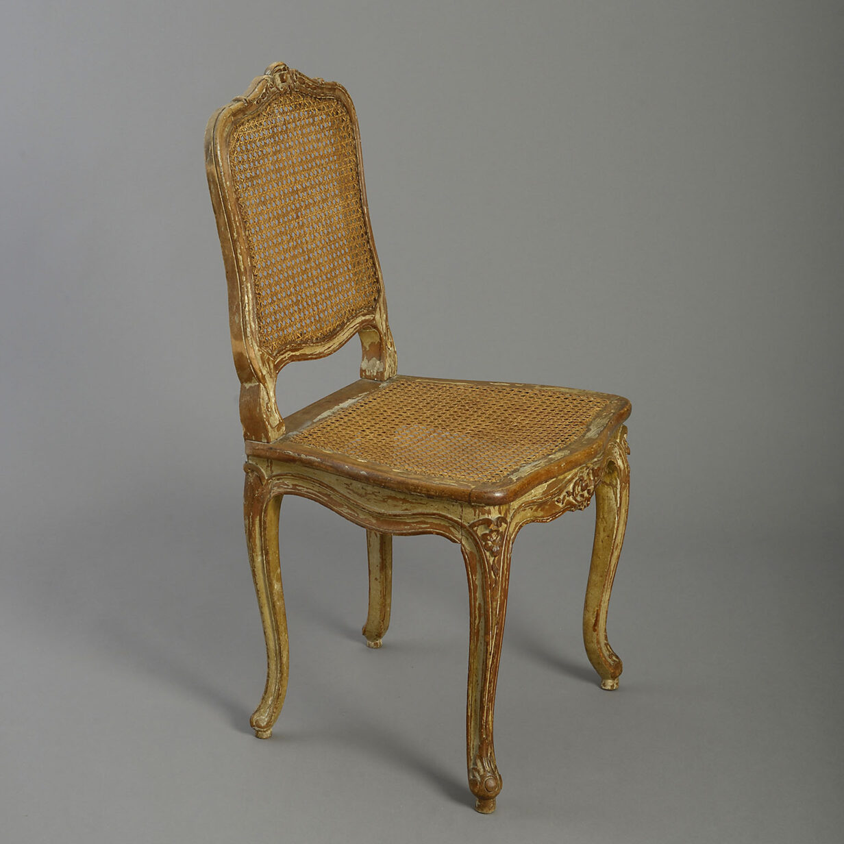 Pair of carved and painted side chairs in the louis xvi manner