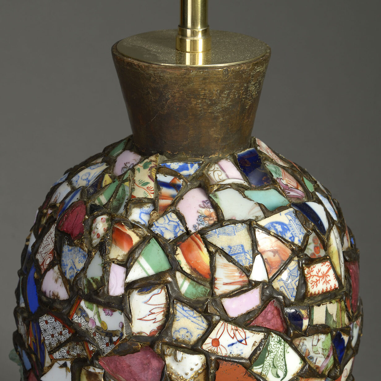 An unusual ceramic collage lamp