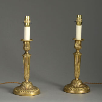 Pair of louis xvi period ormolu candlestick lamps