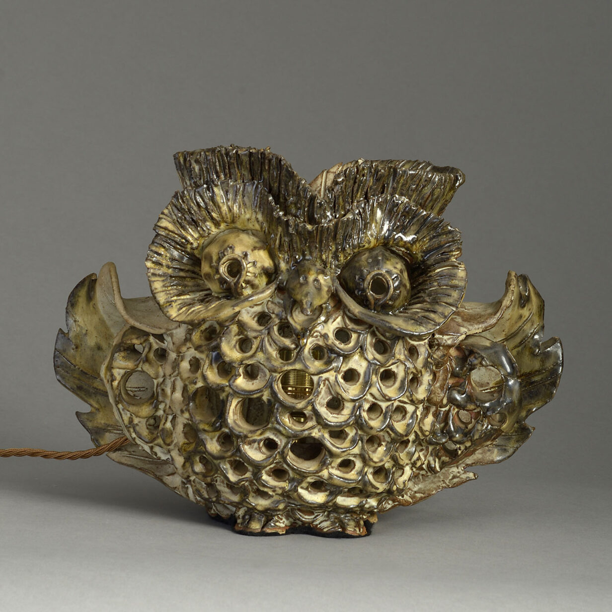 An unusual mid-20th century ceramic owl lamp