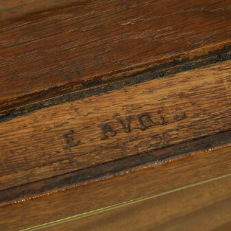 A late eighteenth century gilt brass mounted, ebony and ivory veneered tric trac games table, the leather and green baize covered top revealing a recessed playing surface, the panelled sides with drawers and dummy drawers, all raised on turned tapering fluted legs with brass sabots.   stamped with maker's mark e avril etienne avril 1748-1791. Maitre le 23 novembre 1774 etienne avril was an ebeniste who worked during the reign of louis xvi. He became a master ebeniste in 1774, working in the rue charenton, paris. He was a respected member of the furniture trade and a favourite of marie-antoinette. He aided her in the refurbishment of the chateau de saint cloud and supplied furniture to her private apartments at versailles.