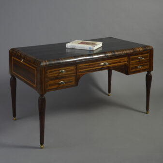 An early 20th century art deco calamander wood writing desk