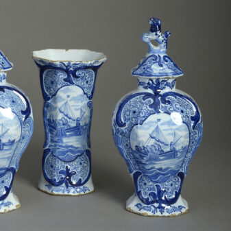 Late 19th century garniture of five delft vases