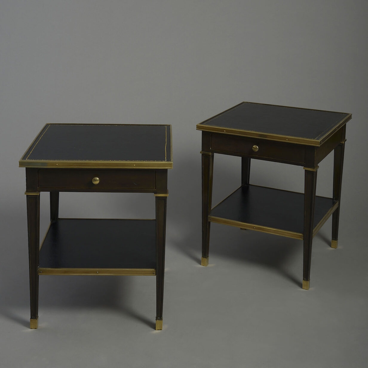 Pair of ebonised end tables