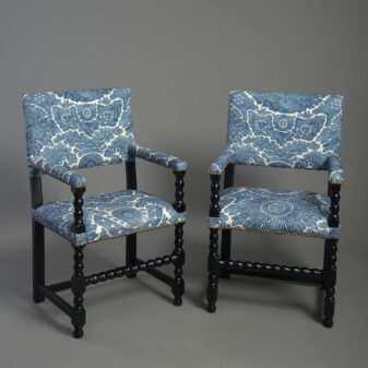 Pair of Ebonised armchairs