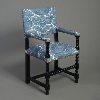Pair of 19th century ebonised open armchairs