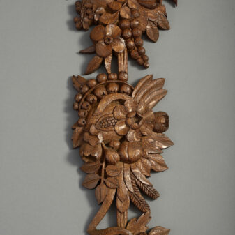Pair of carved oak wall drops