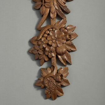 Pair of carved oak wall drops