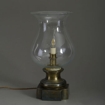 Late 19th century bronzed and glass hurricane lamp