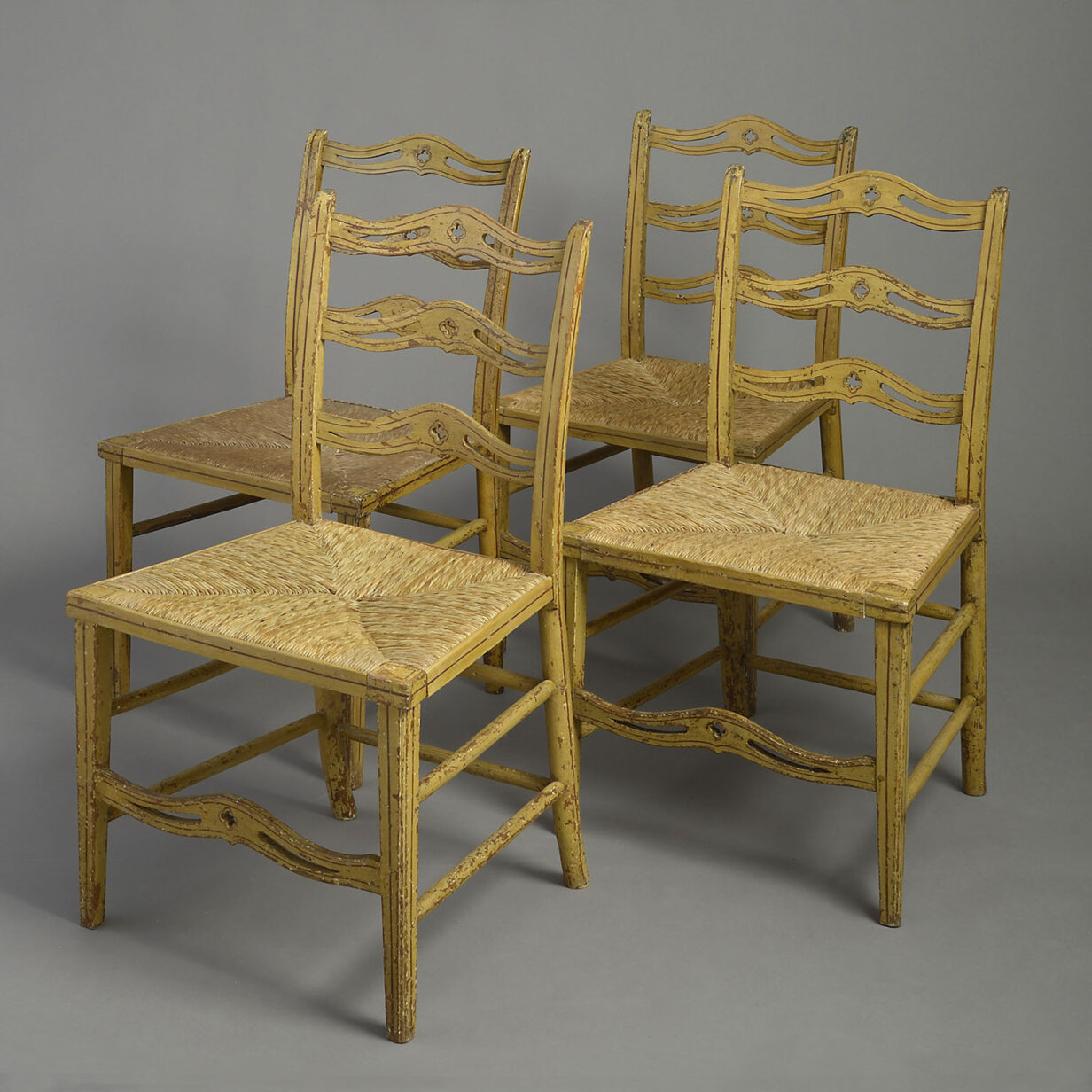 Four Painted Ladder Back Dining Chairs