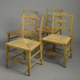Four painted ladder back dining chairs