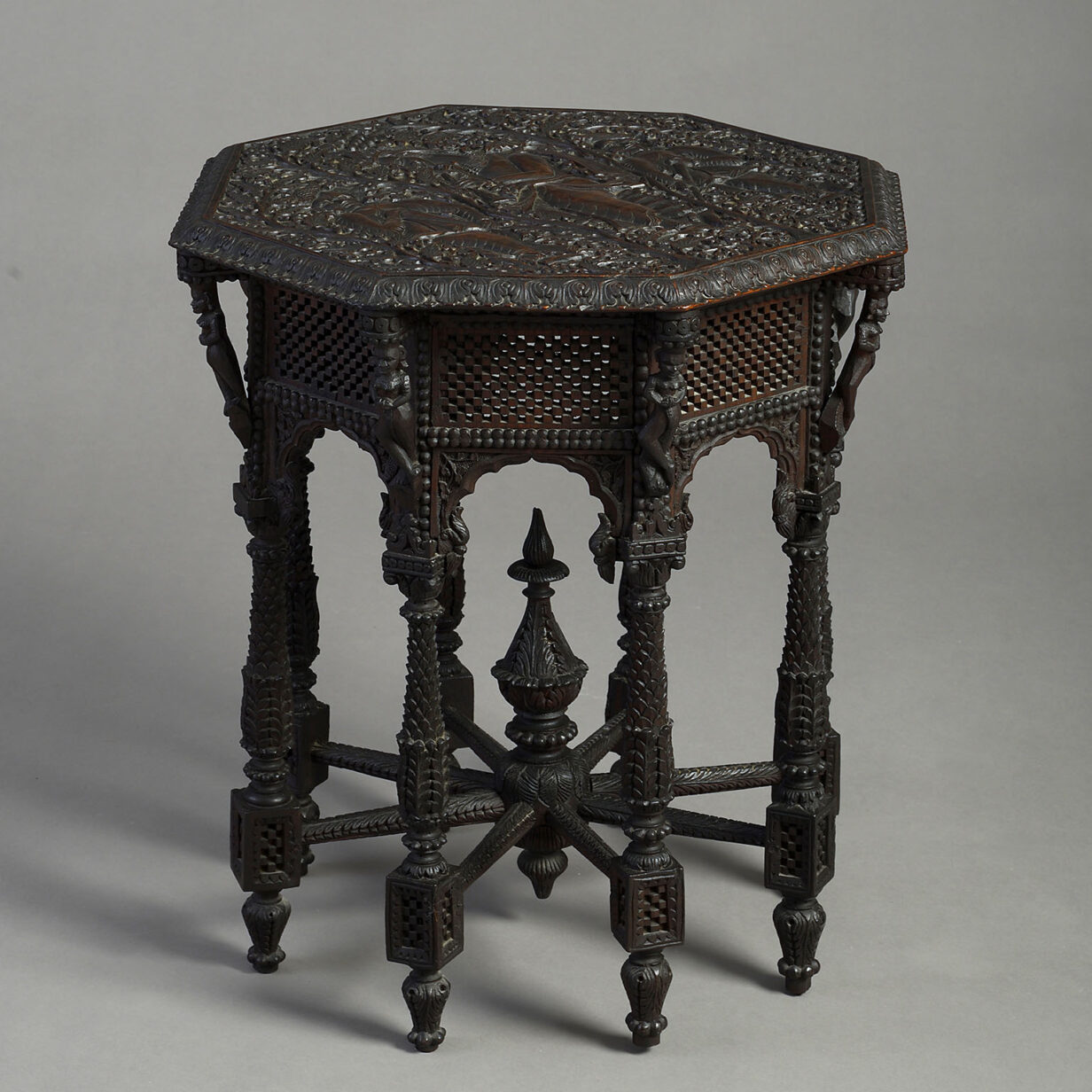 19th century carved, ebonised octagonal occasional table
