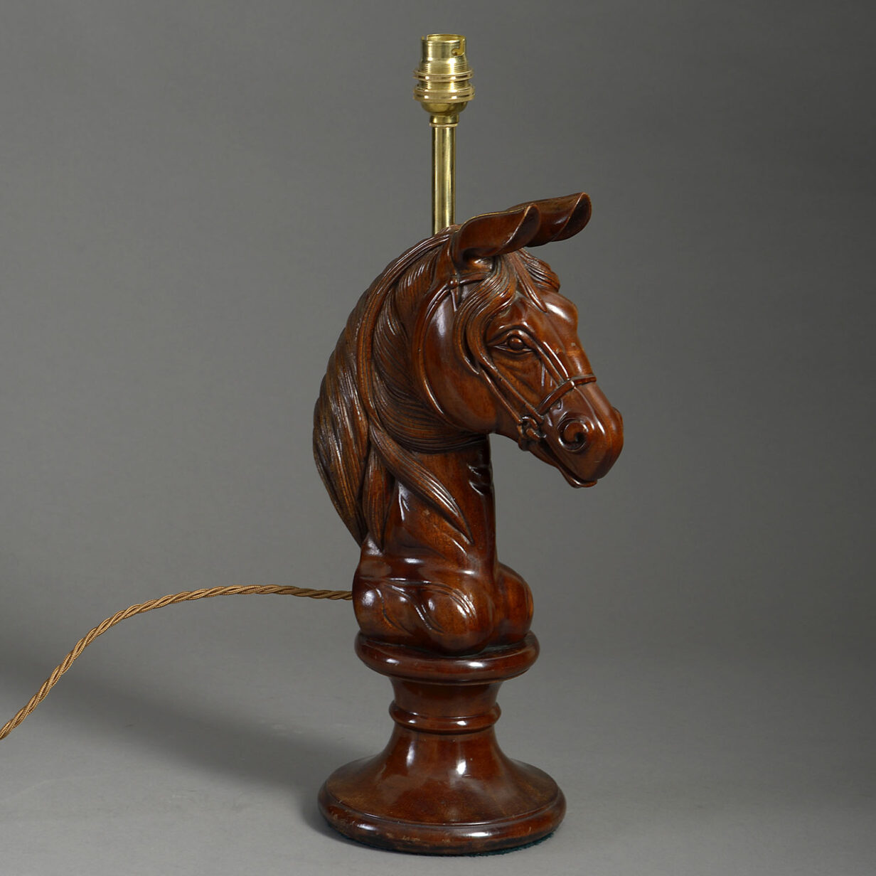20th century carved mahogany horse head lamp base