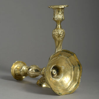 Pair of rococo brass candlesticks