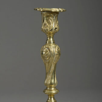 Pair of rococo brass candlesticks