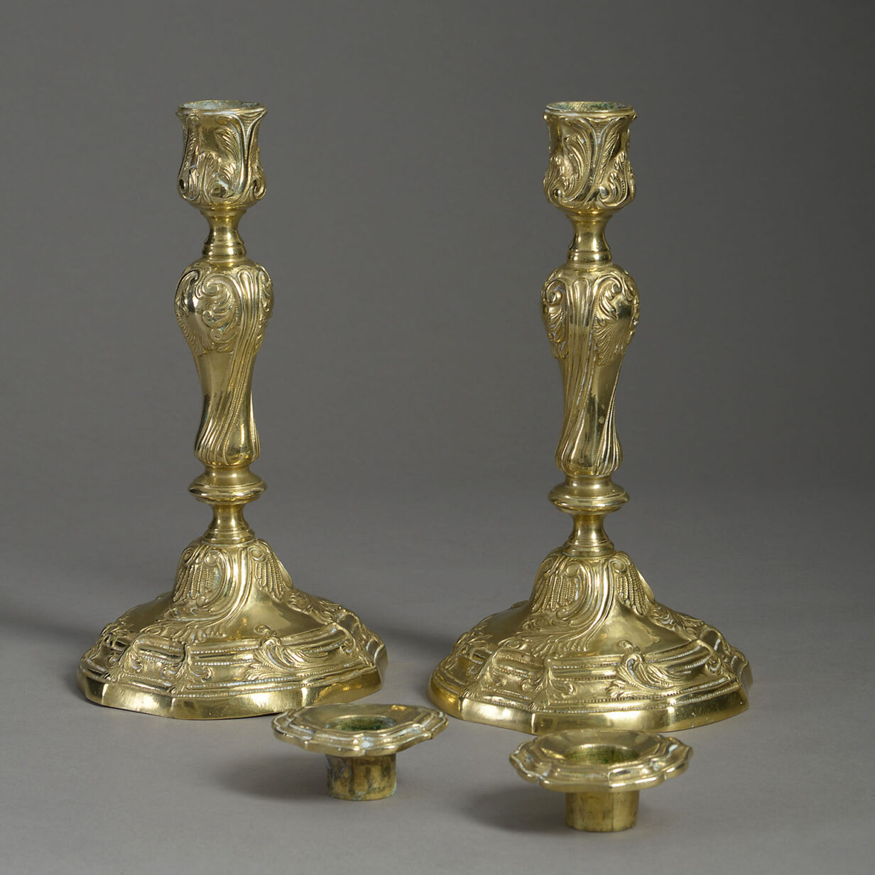 Pair of 18th century louis xv period rococo brass candlesticks