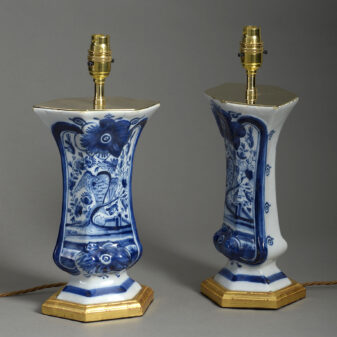 Pair of 19th century blue and white delft pottery trumpet vase lamps